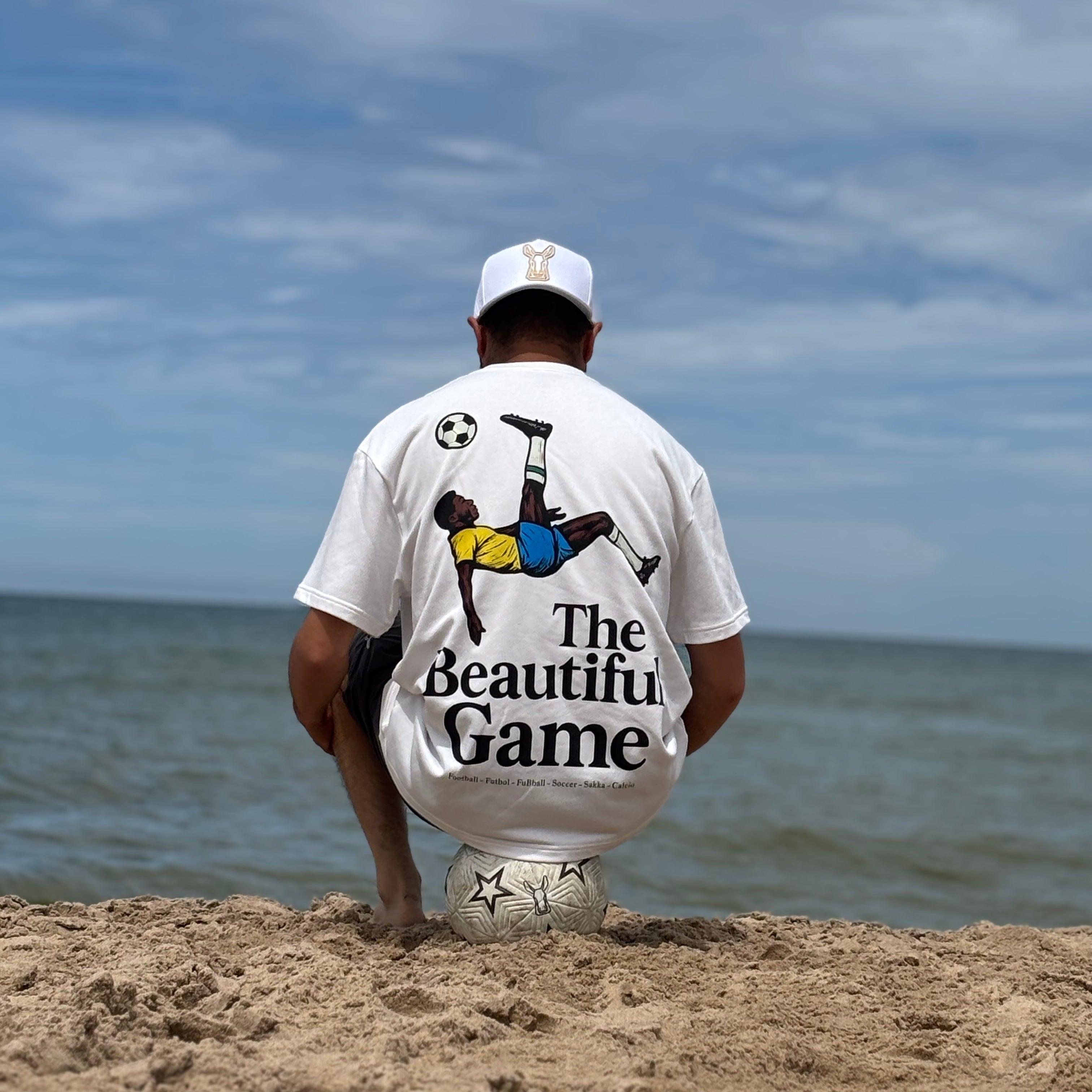 The Beautiful Game graphic tee, for soccer and football enthusiasts. Street wear to show your love of the world's sport. 